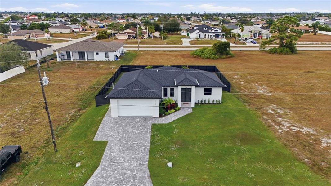 Front exterior of a new home in , Cape Coral, FL, highlighting curb appeal (Image 27).