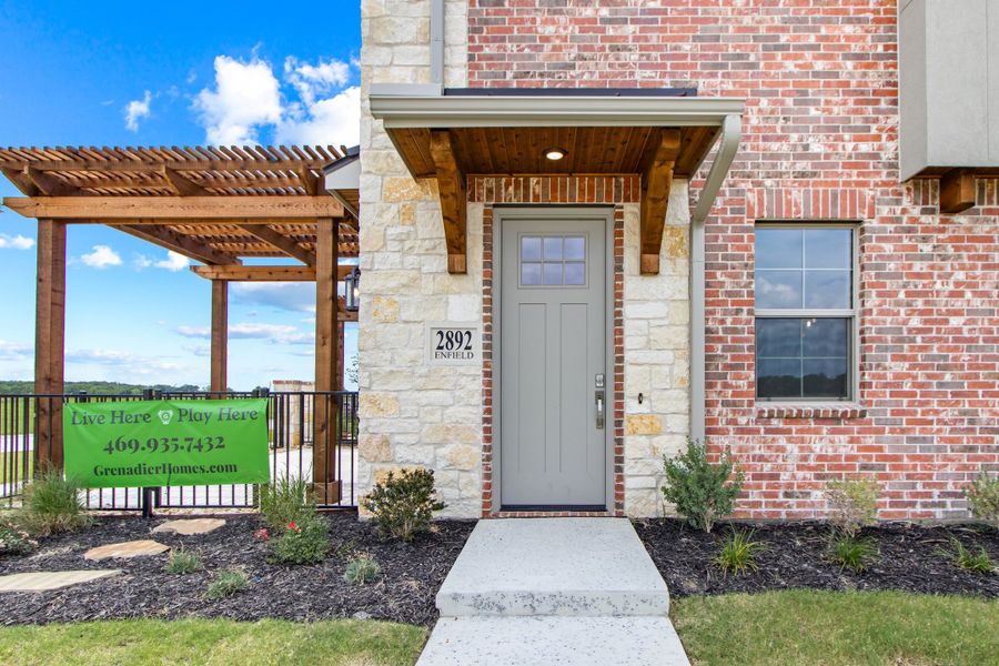 Exterior details and patio area of a home in The Tribute, The Colony (Image 29).