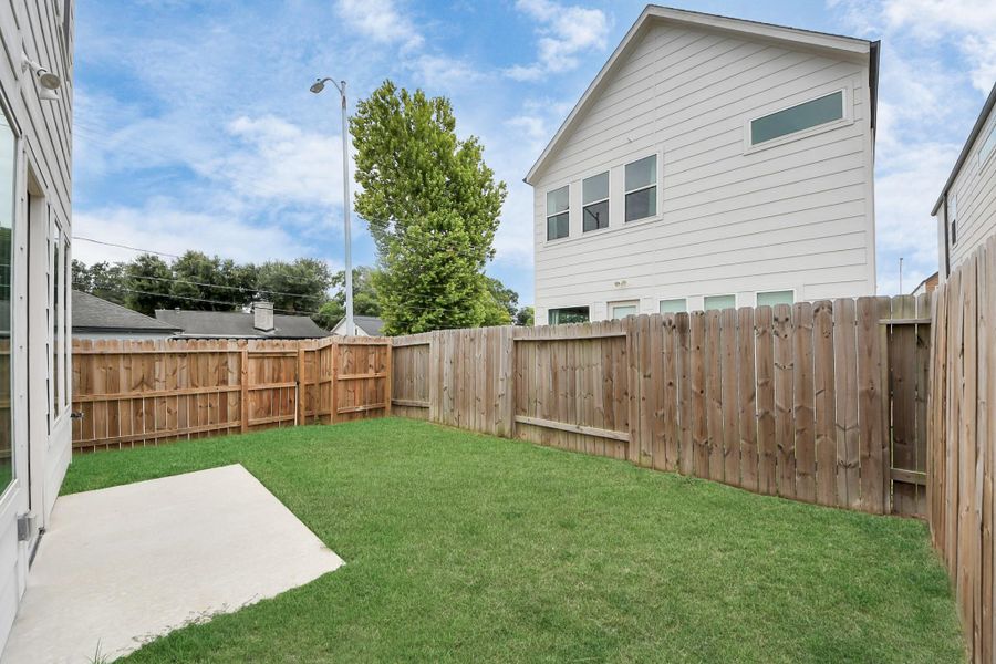 Front exterior of a new home in Agua, Houston, TX, highlighting curb appeal (Image 2).
