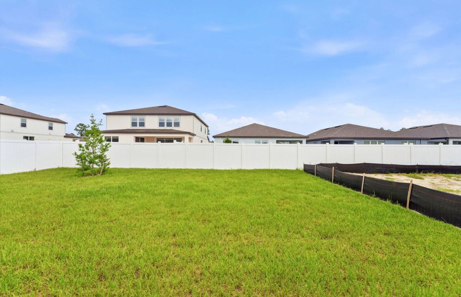 Exterior details and patio area of a home in Caldera, Spring Hill (Image 3).