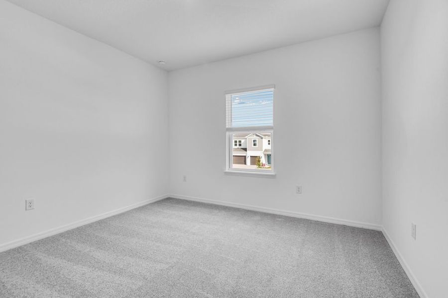 Spacious, unfurnished interior of a new home in Ardisia Park, New Smyrna Beach (Image 16).