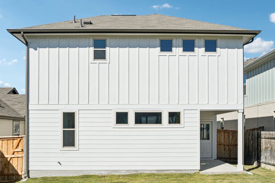 Exterior details and patio area of a home in Crosswinds, Kyle (Image 16).