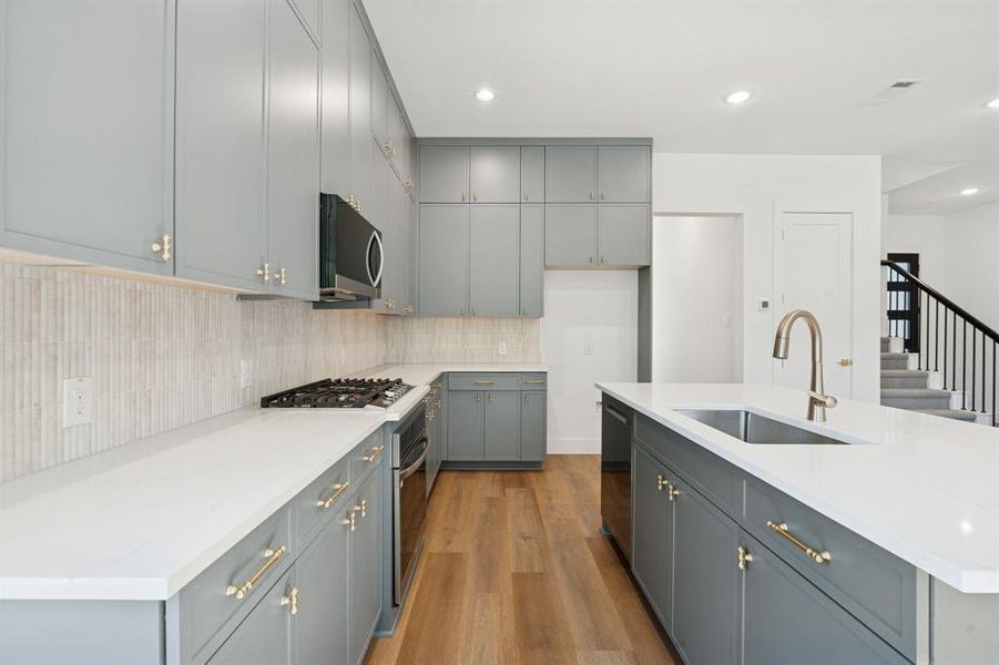 Decorative gold accent hardware.