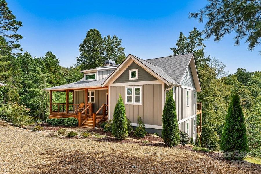 Front exterior of a new home in , Hendersonville, NC, highlighting curb appeal (Image 19).