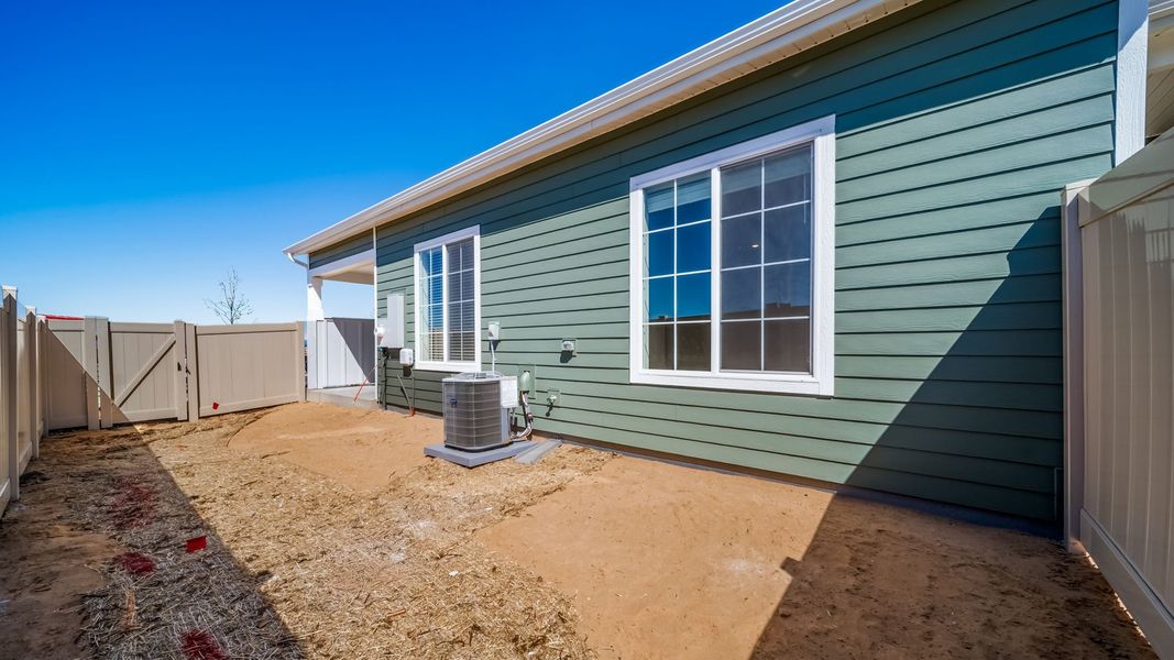 Exterior details and patio area of a home in The Reserve at Green Valley Ranch, Aurora (Image 18).