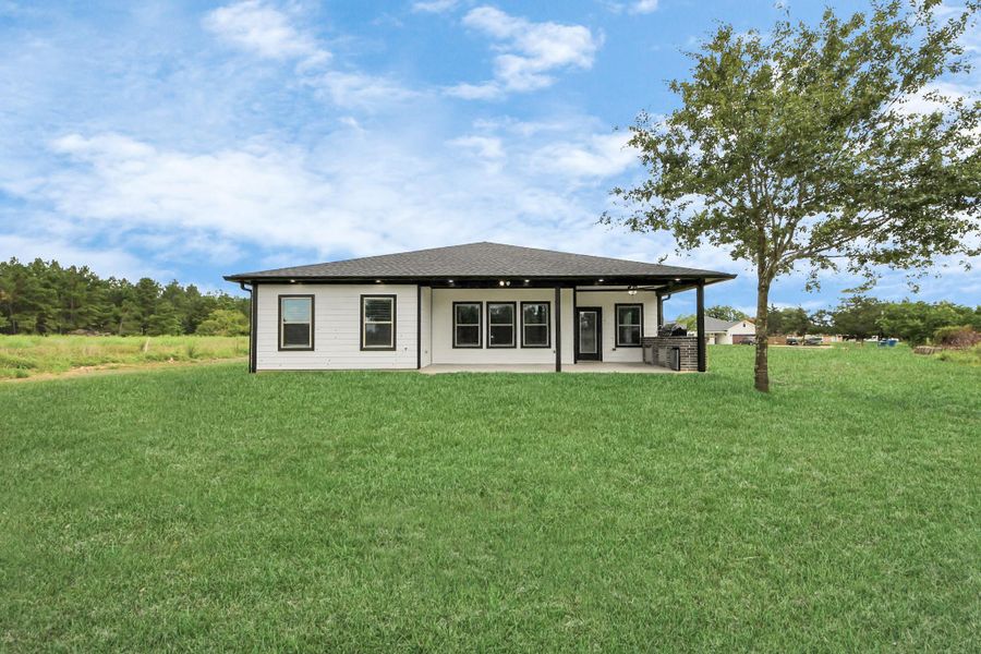 Front exterior of a new home in , Waller, TX, highlighting curb appeal (Image 25).