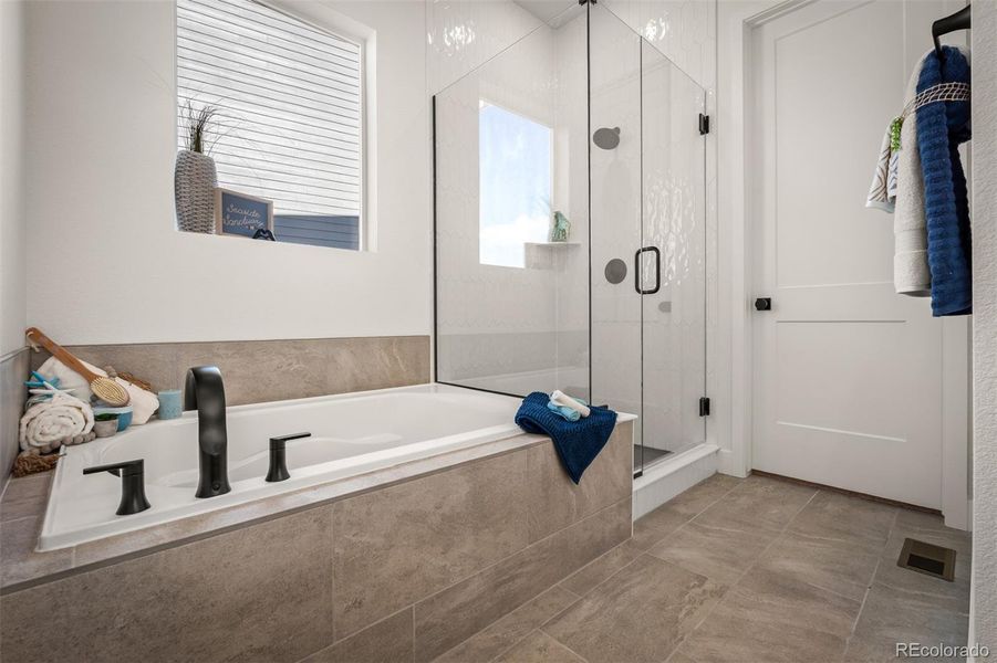 Furnished interior view inside a new home in Revel Crossing at Wolf Ranch - The Panorama Collection, Colorado Springs (Image 17).