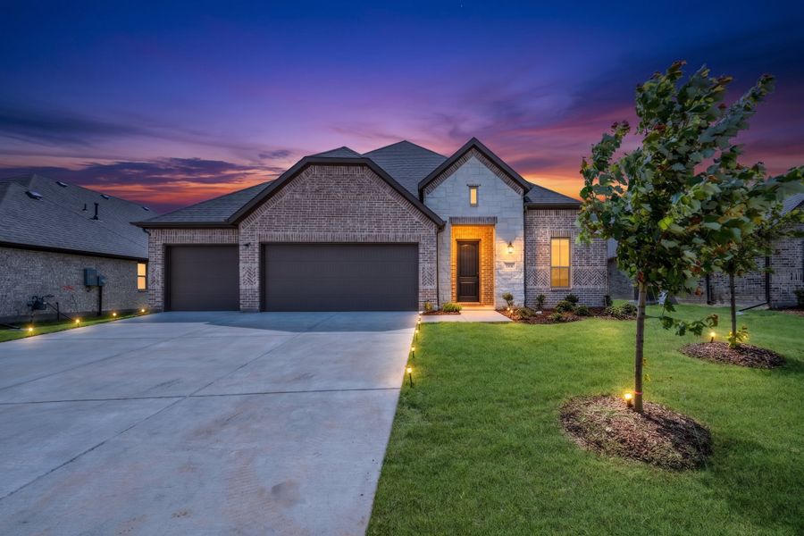 Front exterior of a new home in Forest Ridge Estates, Greenville, TX, highlighting curb appeal (Image 2). Front exterior of a new home in Forest Ridge Estates, Greenville, TX, highlighting curb appeal (Image 2).