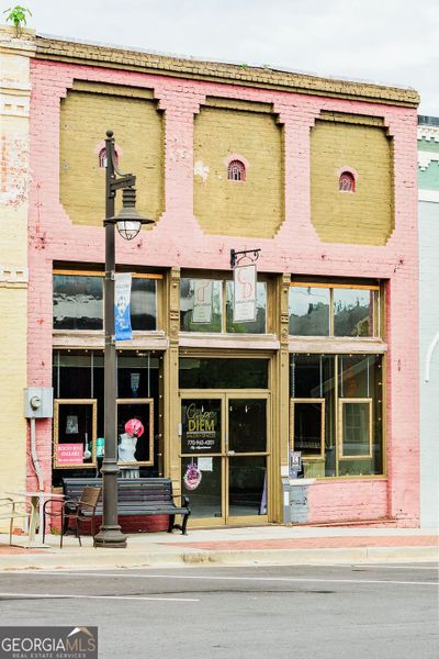Front exterior of a new home in Ponderosa Farms Manor, Gainesville, GA, highlighting curb appeal (Image 48).