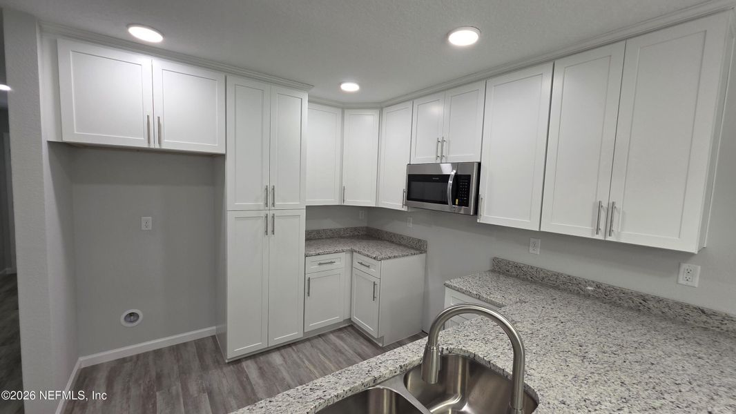 Furnished interior view inside a new home in , Jacksonville (Image 6).