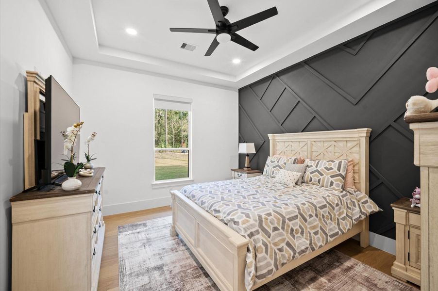 Third bedroom with custom finishes, full bathroom and walk-in closet