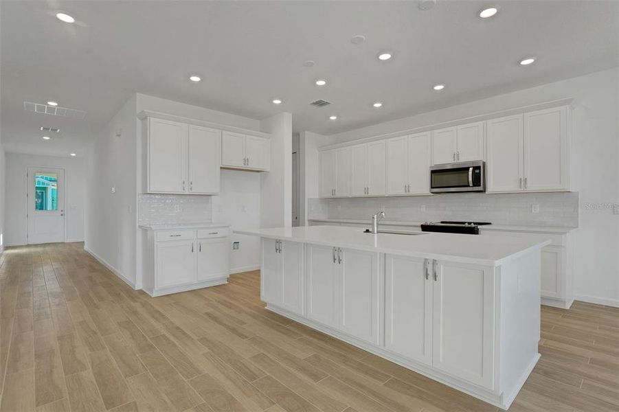 Furnished interior view inside a new home in Green Key Village, Lady Lake (Image 6).