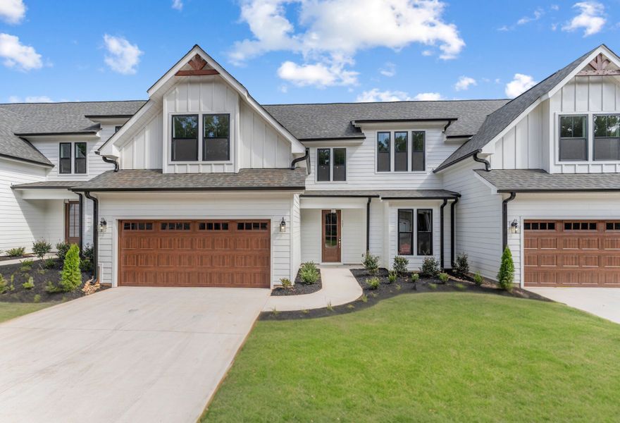 Front exterior of a new home in Landing at Clemson Marina, Seneca, SC, highlighting curb appeal (Image 1).