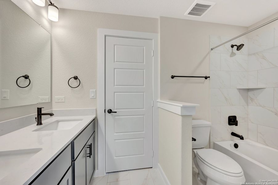 Furnished interior view inside a new home in , New Braunfels (Image 11).