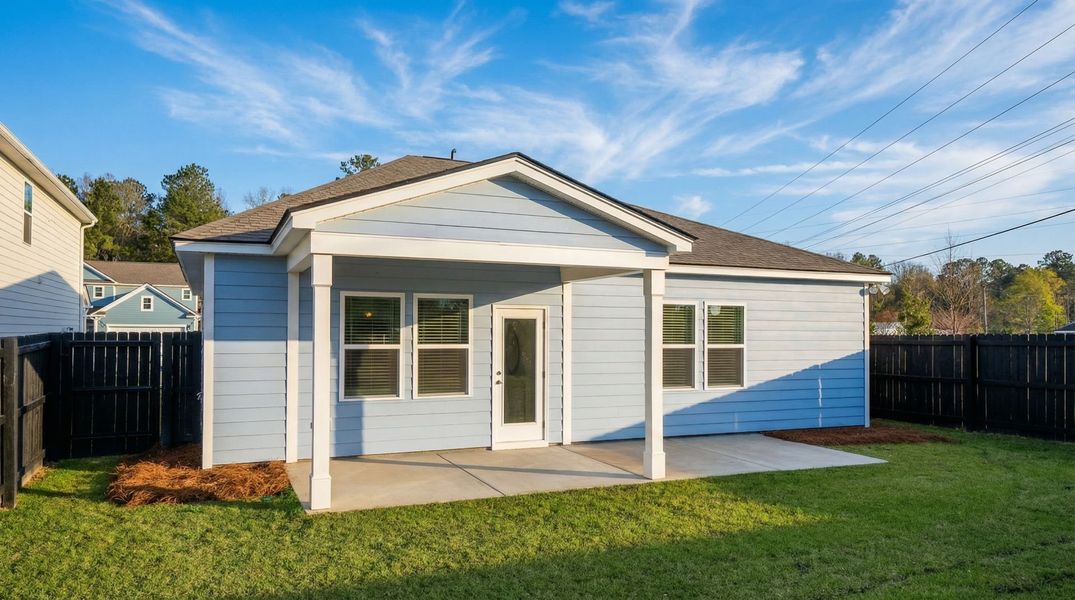 Exterior details and patio area of a home in Monroe Preserve, Chapin (Image 4).