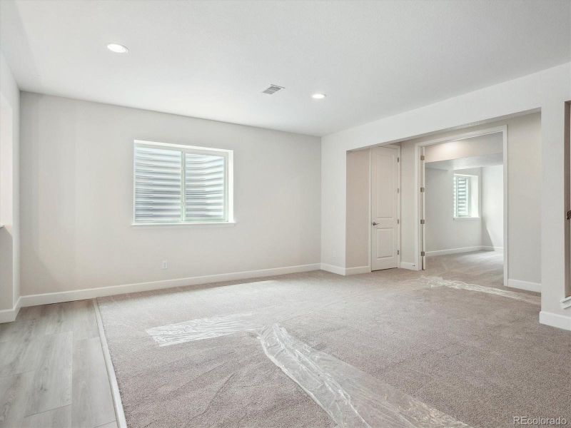 Spacious, unfurnished interior of a new home in Vista Pines at Crystal Valley, Castle Rock (Image 33).