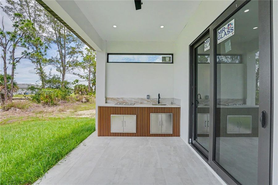 Exterior details and patio area of a home in , Cape Coral (Image 22).