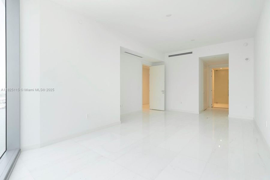 Spacious, unfurnished interior of a new home in Aston Martin Residences, Miami (Image 17).