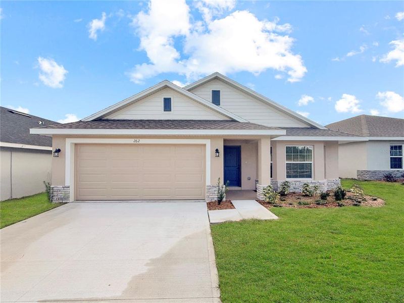 Front exterior of a new home in Arbor Park, Leesburg, FL, highlighting curb appeal (Image 1). Front exterior of a new home in Arbor Park, Leesburg, FL, highlighting curb appeal (Image 1).
