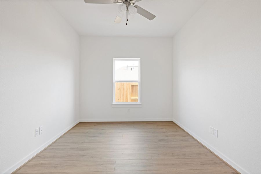 Spacious, unfurnished interior of a new home in Sunterra, Katy (Image 15).