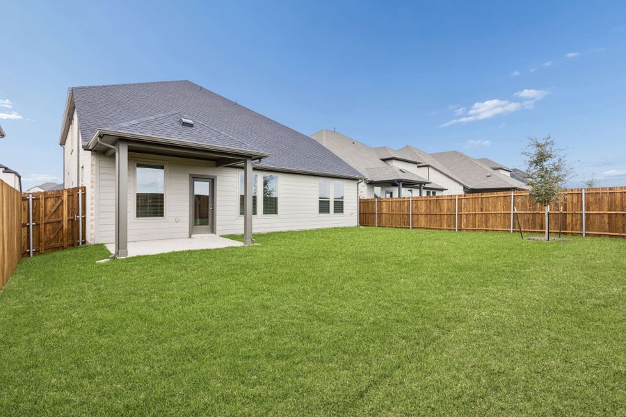 Covered Patio in the Winters home plan by Trophy Signature Homes – REPRESENTATIVE PHOTO