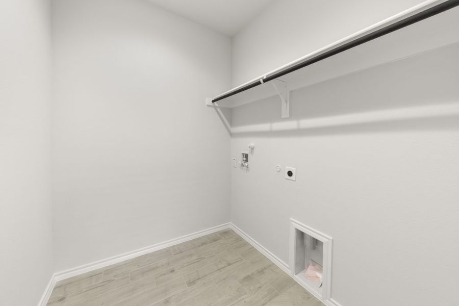 Representative exterior photo of a completed home built from the Maple by Impression Homes in Northspur, Terrell, TX (Image 14).