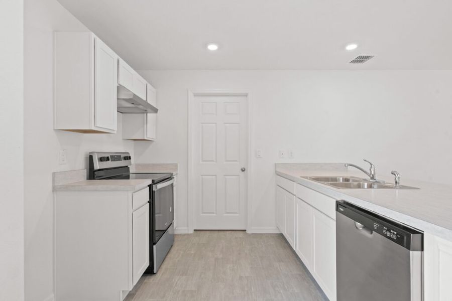Representative furnished interior of a home built from the Phoenix by Holiday Builders in Poinciana, Poinciana (Image 6). Representative furnished interior of a home built from the Phoenix by Holiday Builders in Poinciana, Poinciana (Image 6).