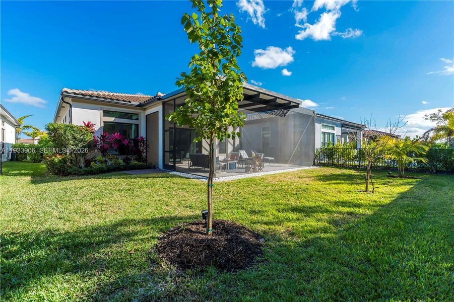 Exterior details and patio area of a home in , Parkland (Image 24).