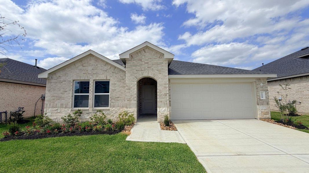 Front exterior of a new home in Cypress Green, Hockley, TX, highlighting curb appeal (Image 2). Front exterior of a new home in Cypress Green, Hockley, TX, highlighting curb appeal (Image 2).