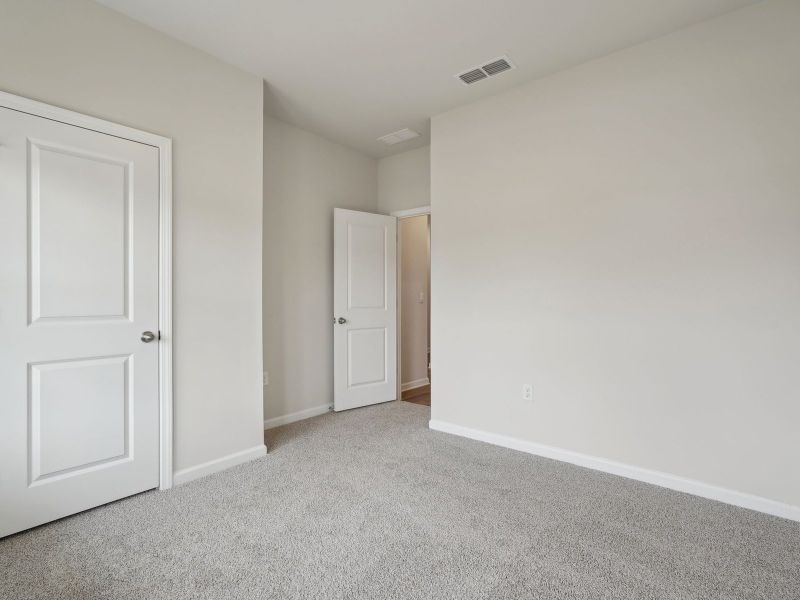 Spacious, unfurnished interior of a new home in Northwoods at Mirror Lake, Villa Rica (Image 16).