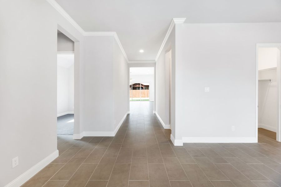 Representative unfurnished interior of a home built from the Bridgeport by UnionMain Homes in Lake Breeze, Lavon (Image 18).
