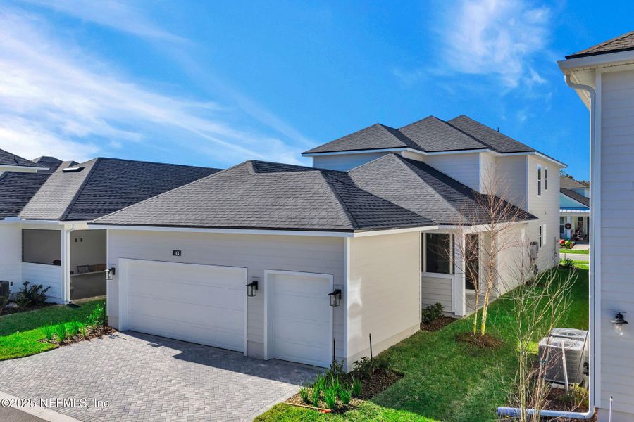 Front exterior of a new home in , Ponte Vedra, FL, highlighting curb appeal (Image 28).