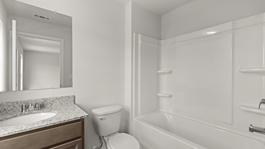 Representative furnished interior of a home built from the Green by D.R. Horton in Aurora Creek, Dallas (Image 11).