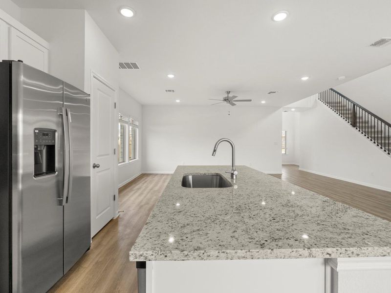 Furnished interior view inside a new home in Crosswinds, Kyle (Image 7).