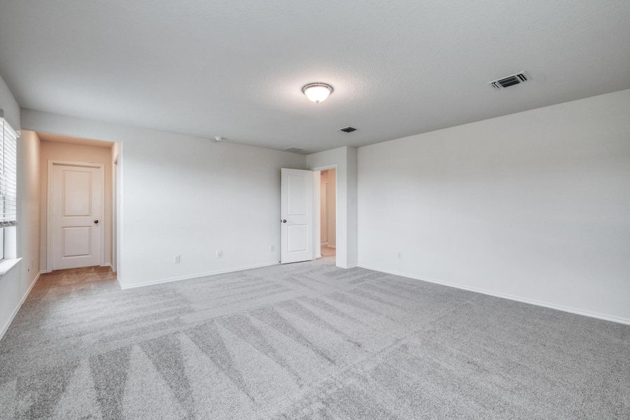 Spacious, unfurnished interior of a new home in Mustang Valley, Manor (Image 22). Spacious, unfurnished interior of a new home in Mustang Valley, Manor (Image 22).