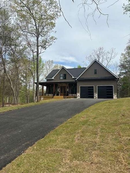 Front exterior of a new home in , Cleveland, GA, highlighting curb appeal (Image 2).