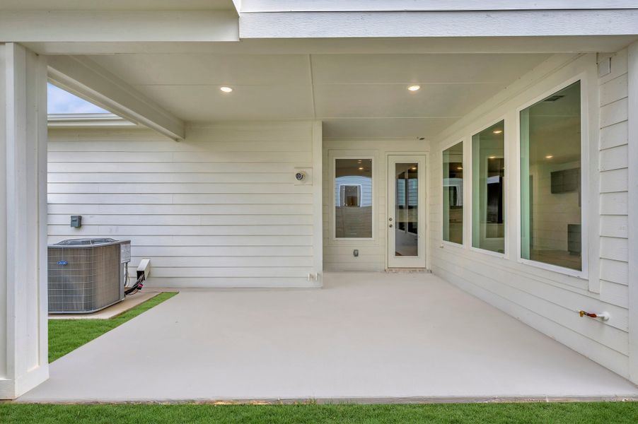 Exterior details and patio area of a home in The Retreat at Harvest, Argyle (Image 16). Exterior details and patio area of a home in The Retreat at Harvest, Argyle (Image 16).