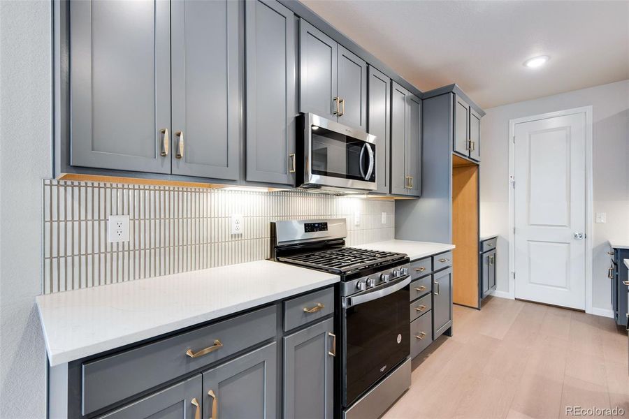 Furnished interior view inside a new home in Painted Prairie, Aurora (Image 8).