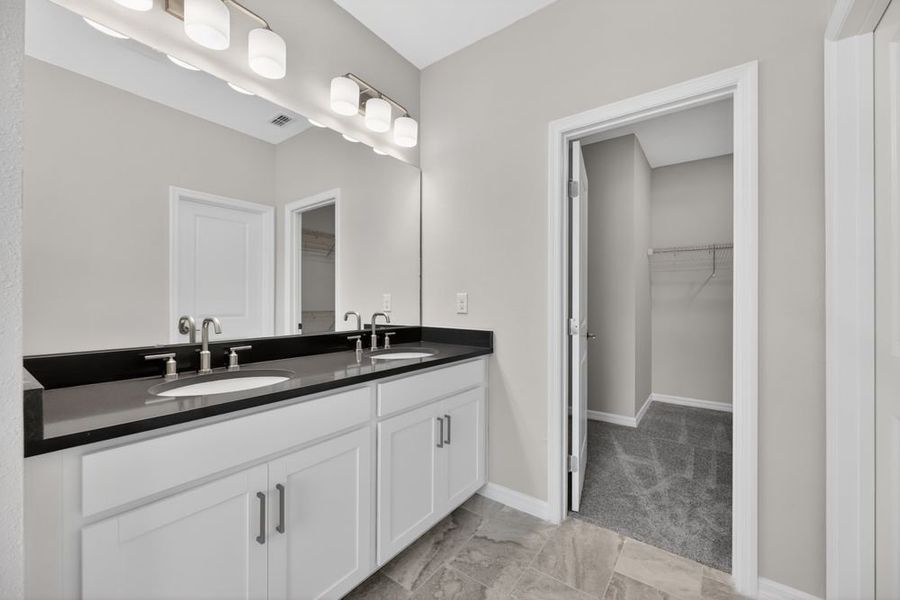 Representative furnished interior of a home built from the Bellflower by Taylor Morrison in Cherry Elm at SilverLeaf, St. Augustine (Image 12).