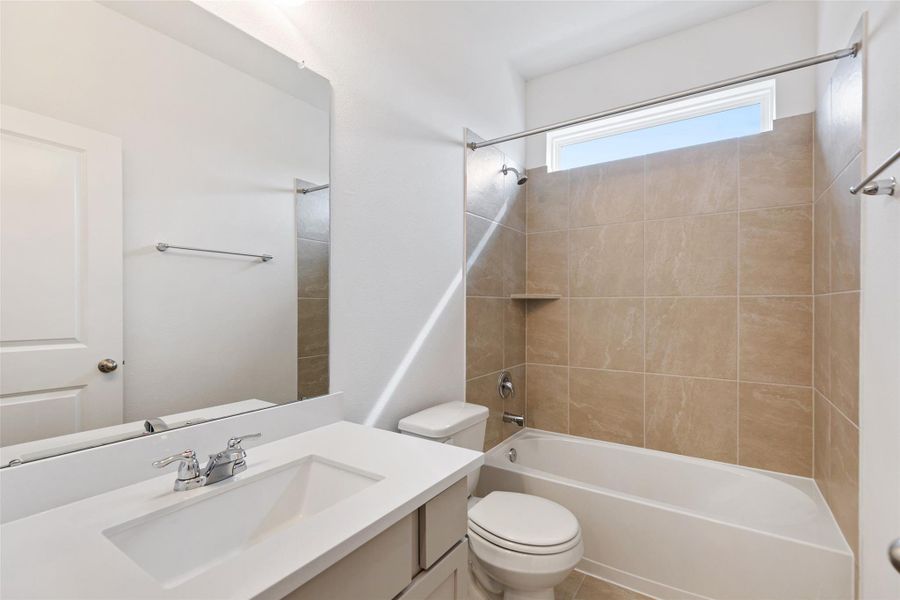 Furnished interior view inside a new home in Aldeana, Bonney (Image 6).