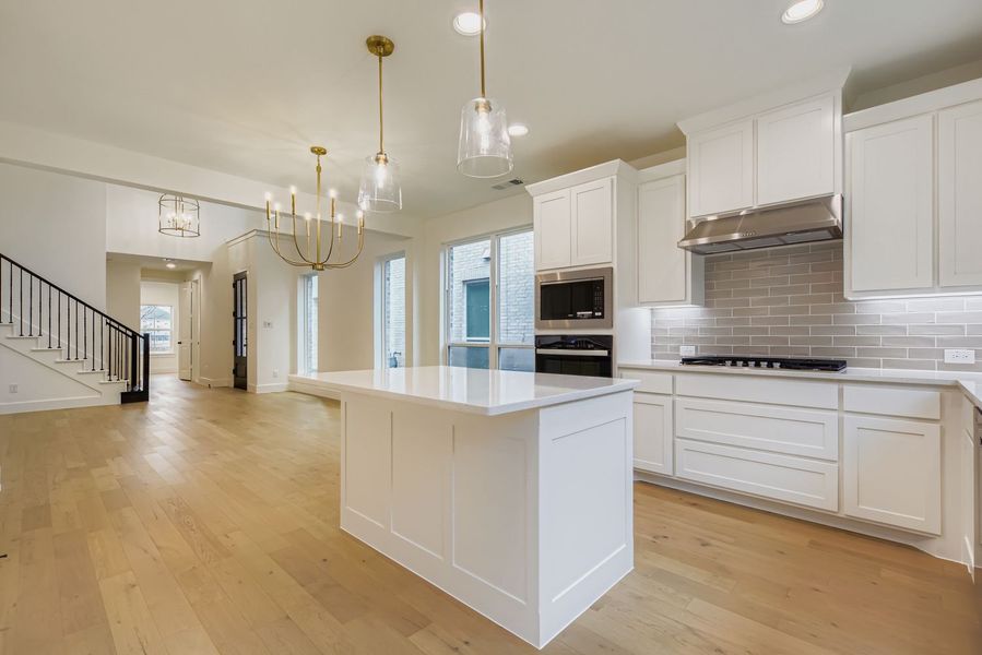 Furnished interior view inside a new home in Castle Hills Northpointe - Townhomes, Lewisville (Image 9).