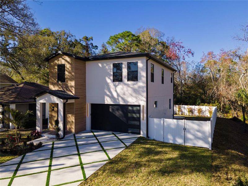 Front exterior of a new home in , Tampa, FL, highlighting curb appeal (Image 2). Front exterior of a new home in , Tampa, FL, highlighting curb appeal (Image 2).