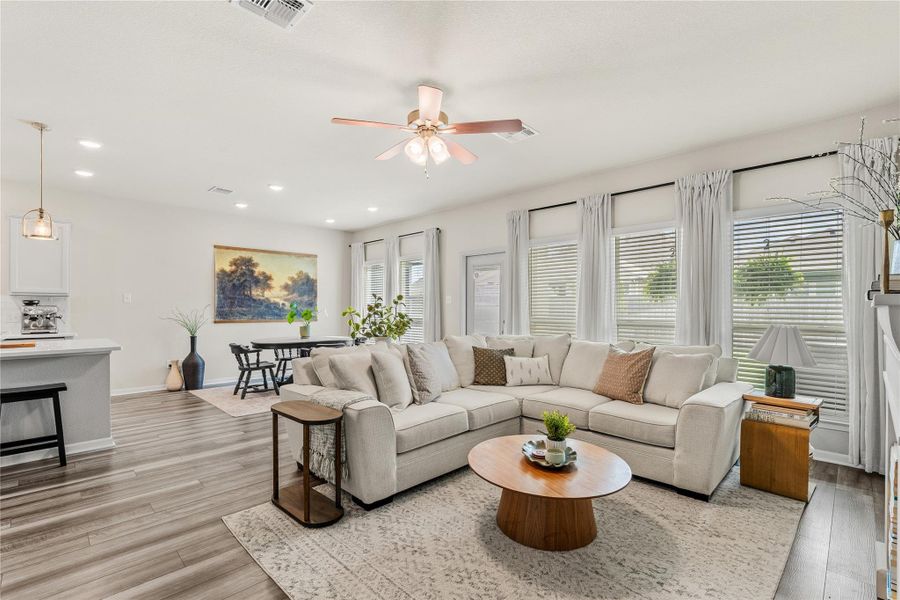 An open concept living area presents abundant natural light and versatile spaces for relaxation and dining. An open concept living area presents abundant natural light and versatile spaces for relaxation and dining.