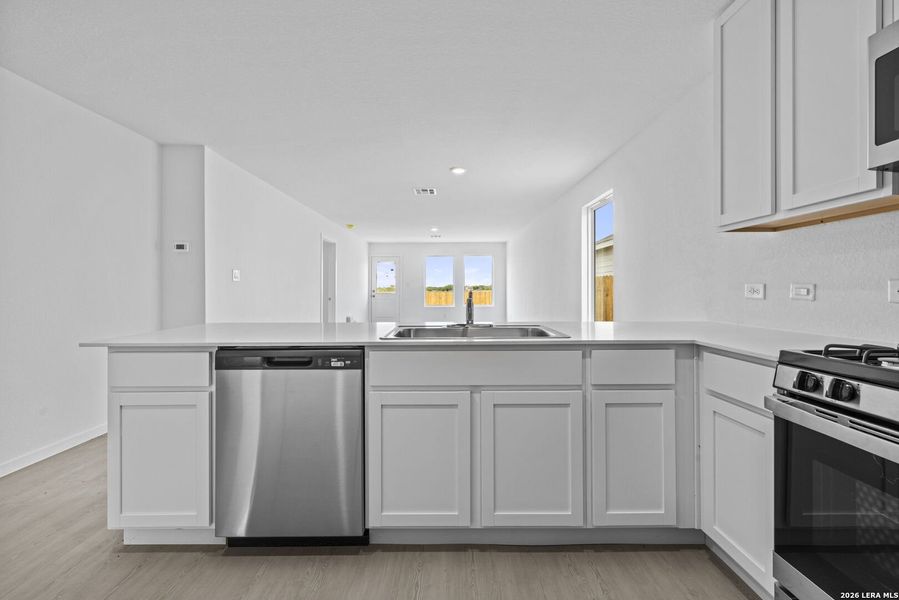 Furnished interior view inside a new home in Spring Grove, St. Hedwig (Image 5).