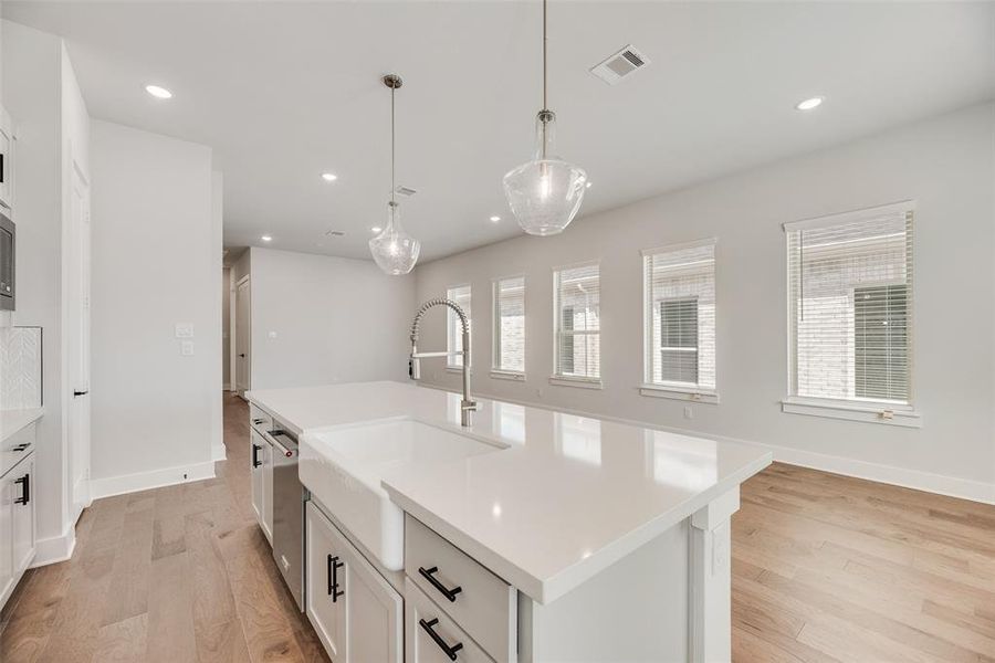 Furnished interior view inside a new home in Collin Creek, Plano (Image 3).