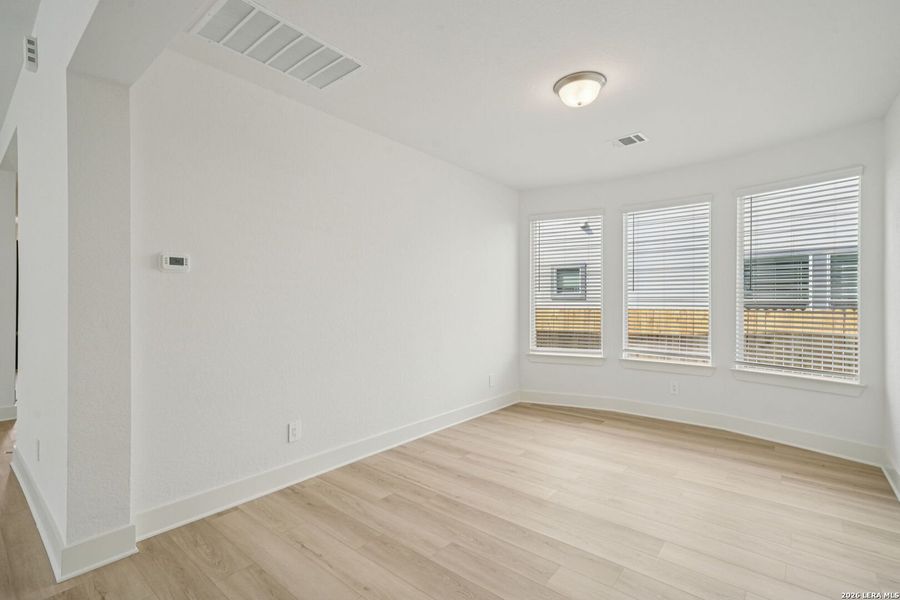 Spacious, unfurnished interior of a new home in Estancia Ranch - Premier Series, San Antonio (Image 26).