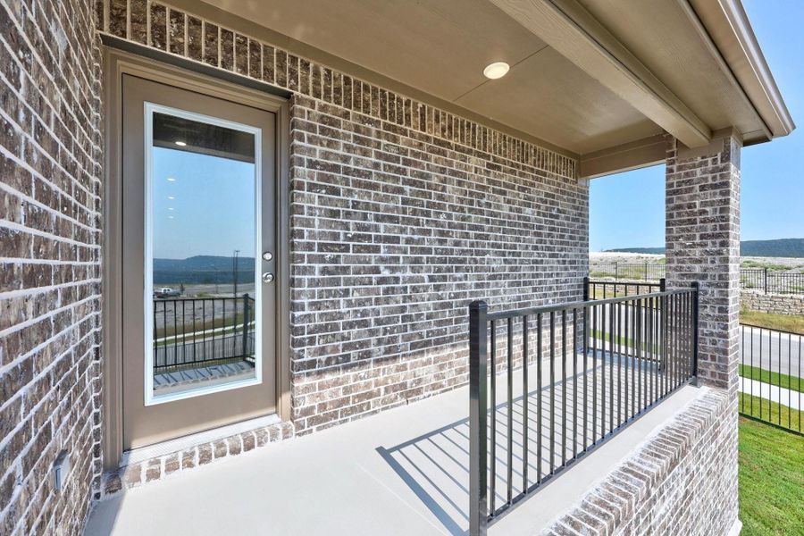 Exterior details and patio area of a home in Lakeside at Tessera, Lago Vista (Image 4).