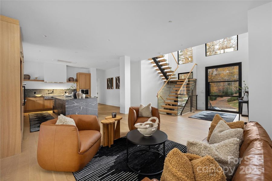 Main level sitting area and kitchen.