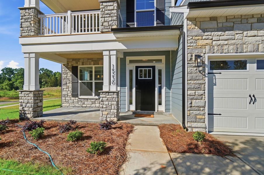 Exterior details and patio area of a home in Enclave at Riverdale, Huntersville (Image 3). Exterior details and patio area of a home in Enclave at Riverdale, Huntersville (Image 3).