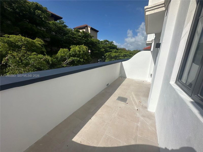 Exterior details and patio area of a home in , Coral Gables (Image 2). Exterior details and patio area of a home in , Coral Gables (Image 2).